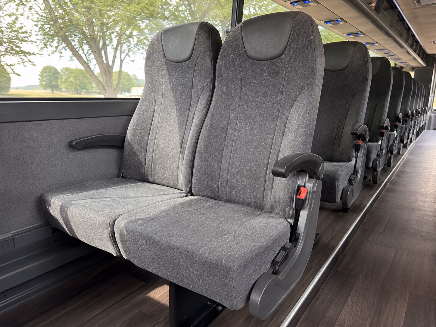 greensboro sporting event transportation onboard seating